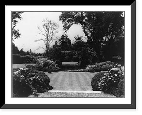 Formal gardens at the home of Mr. & Mrs. Harold I. Pratt, Glen Cove, Long Island, New York, pond and bushes in foreground, Vintage Wall Art