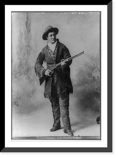 Martha Canary (Calamity Jane), full-length portrait, standing, facing right, holding rifle, Historic Reproduction