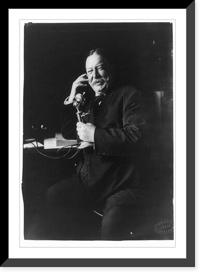 William Howard Taft, three-quarter-length portrait, seated facing left, on telephone.copyright by Harris & Ewing, Historic Reproduction