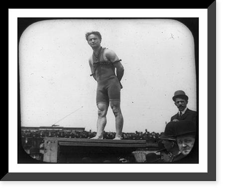 Harry Houdini in bathing suit and chains on platform in front of crowd, Antique Print