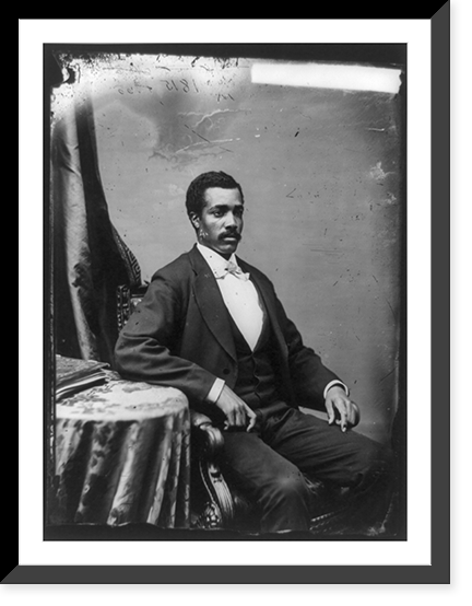 Hon. Josiah Thomas Walls, Afro-American representative of Florida, three-quarter length portrait, seated by small table, facing right, Vintage Wall Art