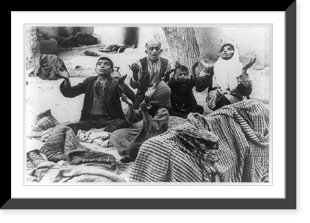 Earthquake victims in Tehran, Iran, praying to Allah for protection as they camp with their belongings in the open air northwest of Tehran Classic, Antique Wall Art
