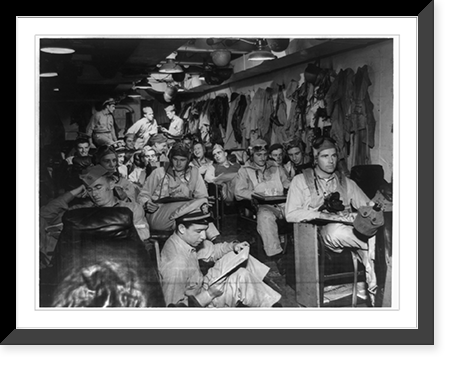 Navy fighter pilots in the ready room of their aircraft carrier before a strike somewhere in the Pacific in a recent battle operation, Vintage Wall Art