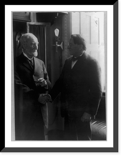Historic Framed Print, [Joseph Gurney Cannon, three-quarter length portrait, facing right, shaking hands with Rep. Sweet],  17-7/8" x 21-7/8"