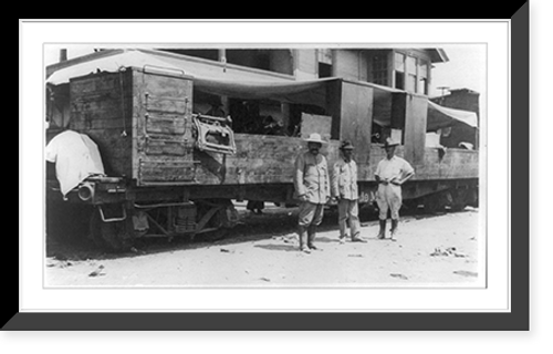Historic Framed Print, [Three soldiers standing by armored railroad car, of S.P.deM. train, during the Mexican revolution],  17-7/8" x 21-7/8"