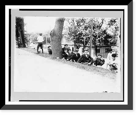 Group of boys with golf clubs. probably caddies. resting on hill Classic, Antique Poster