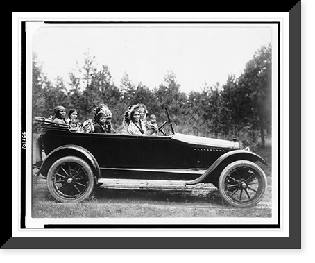 Coeur D'Alene man, Phillip Wildshoe and family, in his Chalmers automobile, Antique Print