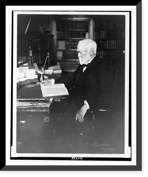 Historic Framed Print, [Andrew Carnegie, three-quarter length portrait, seated at desk, reading, facing left].Marceau, New York.,  17-7/8" x 21-7/8"