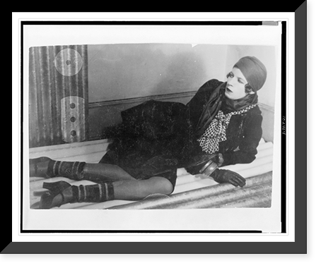 Nancy Cunard, full-length portrait, facing left, lying down, leaning on elbow, in London, Historic Print