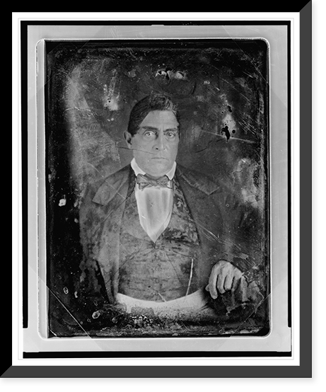Unidentified man, about 40 years of age, half-length portrait, nearly facing front, hand resting on table with tablecloth, Vintage Wall Art