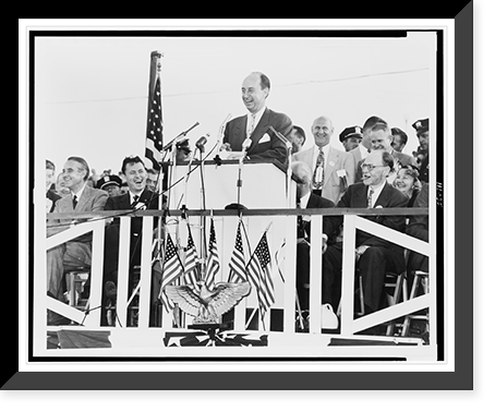 Adlai E. Stevenson, half-length portrait, facing left, standing at podium, speaking to crowd, at Asbury Park, New Jersey, Antique Print