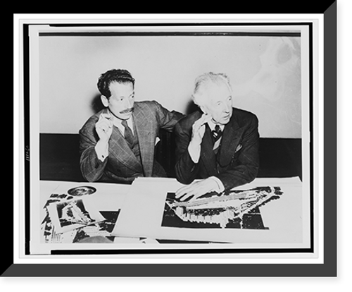 Historic Framed Print, [Frank Lloyd Wright, seated at a table with Roy S. Thurman; drawings for Crystal Heights in Washington, D.C., are on the table].Harris & Ewing.,  17-7/8" x 21-7/8"