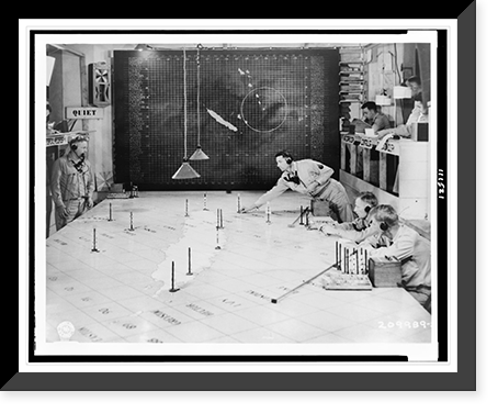 Members of the Signal Corps using radar plotting board as an aircraft warning information center at 1st Island Command Headquarters, Noumea, New Caledonia.Signal Corps photo. Vintage Wall Art Pri