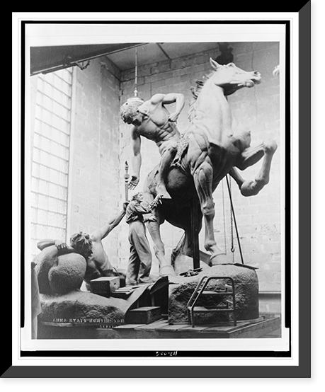 Anna Hyatt Huntington working on the Torch Bearers, a sculpture of a man, lying on ground, passing a torch to man on horseback, Vintage Wall Art