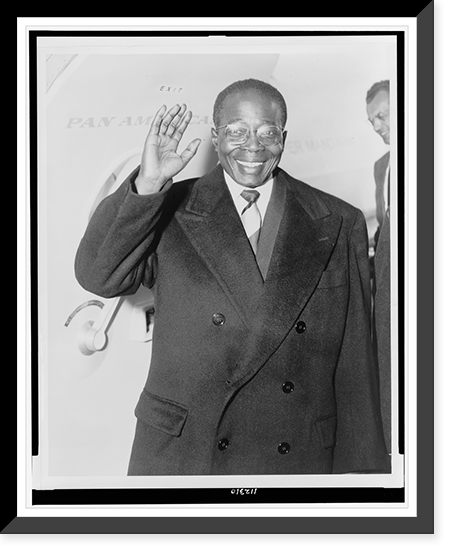 Leopold Senghor, half-length portrait, standing, facing front, waving from airplane, Historic Print