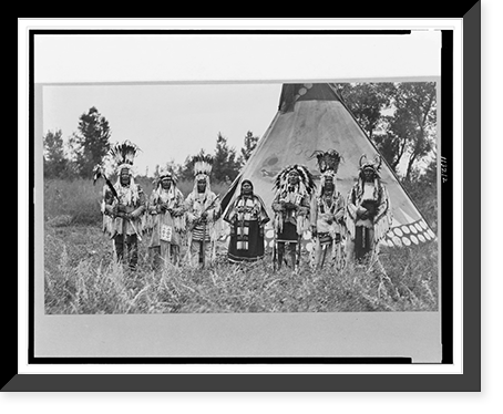 Group of Siksika (Blackfeet) men and one woman singing in front of tipi, Vintage Poster