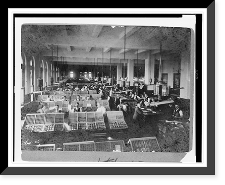 Men posed at their workstations in the composing room in the Pulitzer Bldg. Classic, Antique Print