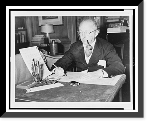 Historic Framed Print, [Jerome Kern, half-length portrait, seated at desk with musical scores],  17-7/8" x 21-7/8"