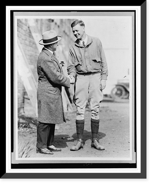 Historic Framed Print, [Charles Lindbergh shaking hands with Rini(?) Vouch],  17-7/8" x 21-7/8"
