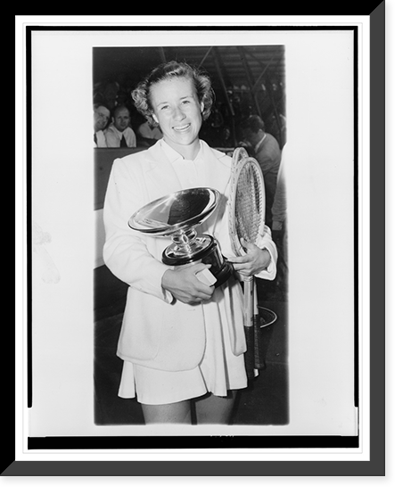Maureen Connolly holding two tennis rackets and trophy after winning women's singles title at Forest Hills, New York, Vintage Poster