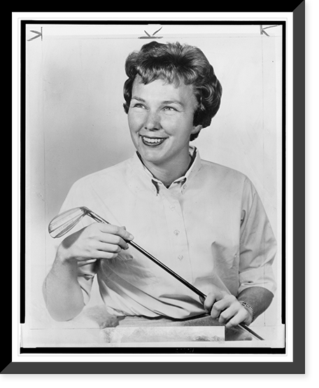Mickey Wright, half-length portrait facing left, holding golf club, Antique Poster