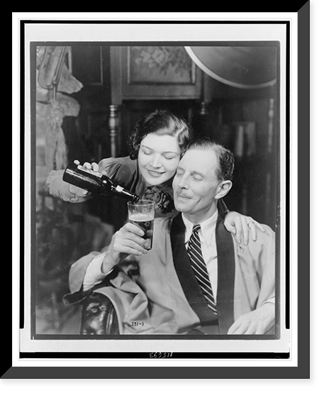 Vintage Americana Print - Young woman pouring beer into older man's (2)