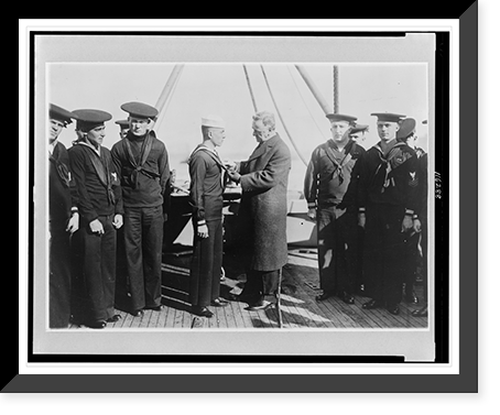 Secretary of The Navy Josephus Daniels decorating seaman Ray Messanelli with Distinguished Service Medal and Croix de Guerre while aboard minesweeper Heron"", Vintage Print