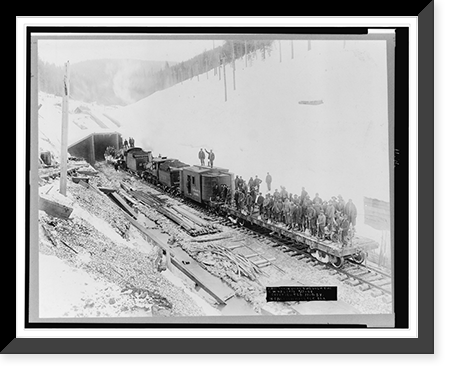 First train going through the C.M. & St. P. Pass, Bitter Root Mountains, Idaho, Antique Poster