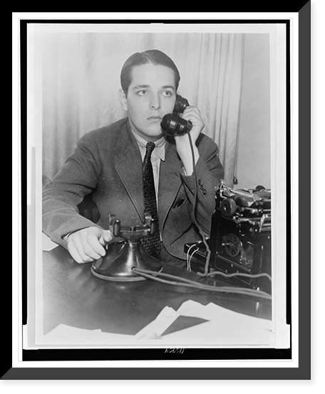 Ring Lardner, Jr., half-length portrait, seated, talking on telephone, Vintage Poster