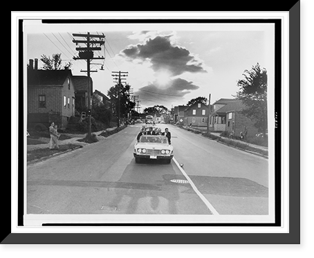 Senator John F. Kennedy, seated on back of convertible with three other people, campaigning in Portland, Maine Classic, Historic Reproduction