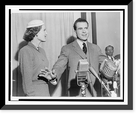 Vice President elect Richard Nixon standing behind microphones with wife Pat, Vintage Poster