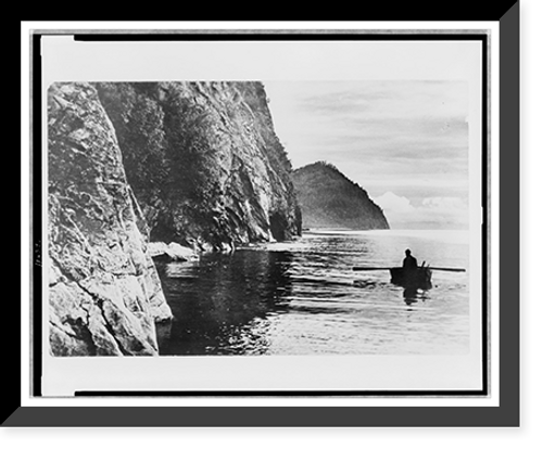 Historic Framed Print, [Man in rowboat, near cliff, Lake Baikal, Russia],  17-7/8" x 21-7/8"