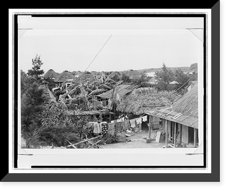 Scene of a replaced village of Sobe, Yomitan-son, with poorly constructed houses of people whose land was requisitioned for military use, Historic Reproduction