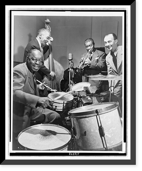 Historic Framed Print, [Louis Armstrong on trumpet, Warren Dodds on drums and George Foster on the double bass during broadcast of This is Jazz" radio show,  directed by Rudi Blesh (far right)]",  17-7/8" x 21-7/8"