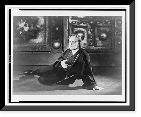 Act I, Scene 2 of Hamlet, showing Hamlet reclining on leg and left hand, Mayakovsky Theater, Moscow, Russia, Vintage Poster