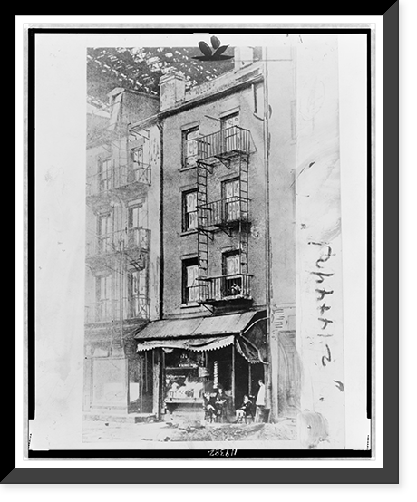A view of the building, at 174 South Street on the East Side, New York, where Governor Al Smith was born, Vintage Print
