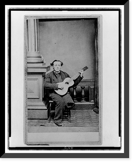Civil War soldier, with one leg, full-length portrait, seated, facing front, holding guitar, Vintage Poster