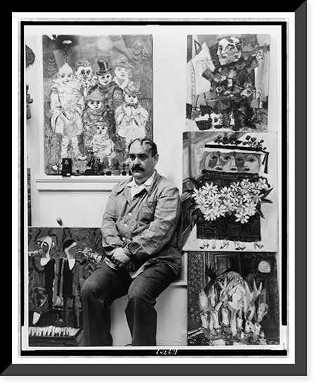 Zero Mostel, three-quarter length portrait, seated, facing left, with some of his paintings in his New York apartment, Vintage Poster