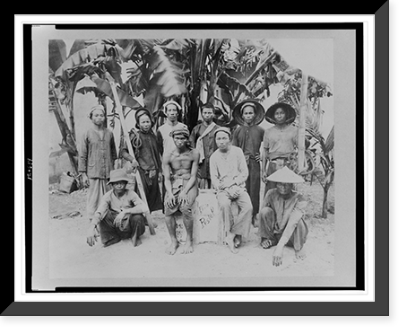 Historic Framed Print, [Group of ten workers posed by palm trees, Saigon, South Vietnam],  17-7/8" x 21-7/8"