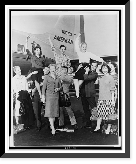 Members of the New York City Ballet Company pose for the photographer at La Guardia airport before boarding an American Airlines flite sic to Chicago Classic, Historic Print