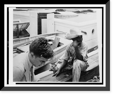 Alan Lomax (left) youngster on board boat, during Bahamas recording expedition, Vintage Print