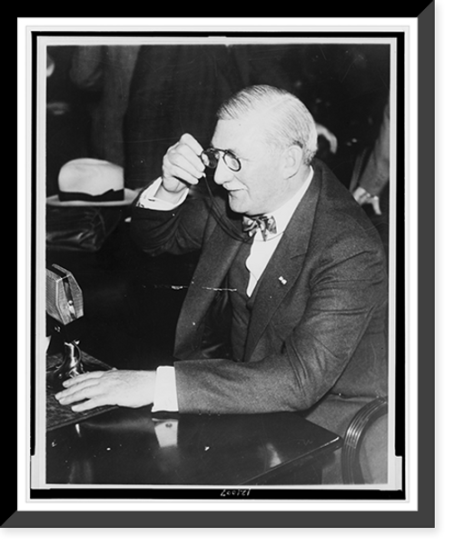 Historic Framed Print, [William S. Knudsen, half-length portrait, seated, facing left, testifying before the Monopoly Investigating Committee],  17-7/8" x 21-7/8"