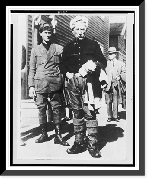Historic Framed Print, [Roald Amundsen, full-length portrait, standing, facing front, arriving in Nome, Alaska, after his transpolar flight from Spitzbergen to Alaska],  17-7/8" x 21-7/8"