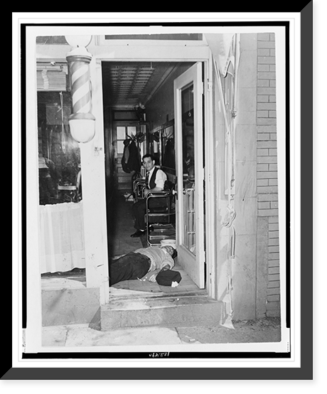Photograph shows a dead man lying inside the door of a barber shop, Antique Poster
