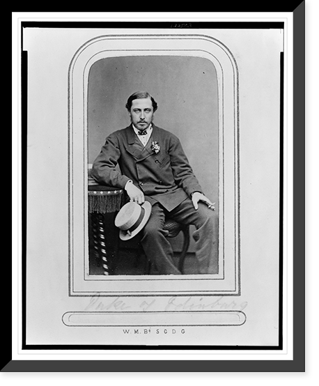 Prince Alfred, full-length portrait, seated, facing front, right arm resting on table, holding hat in right hand, cigarette in left, Historic Reproduction