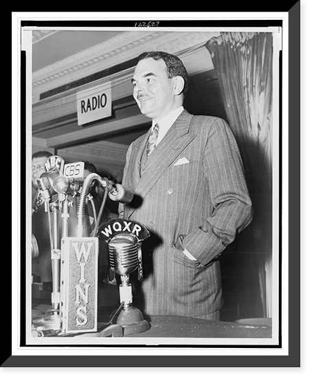 Gov. Thomas E. Dewey, half-length portrait, facing left, speaking before microphones at a press conference in New York, following his upset loss to President Truman, Antique Wall Art