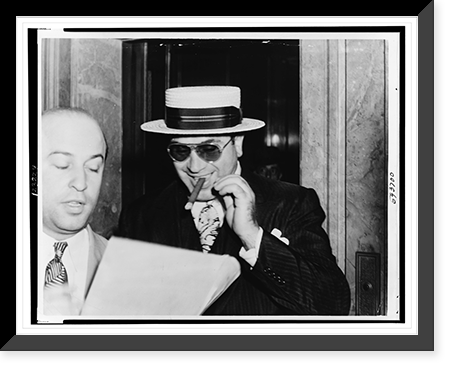Al Capone, with a cigar and a big smile, leaving Federal building in Miami, Fla., preceded by his attorney Abe Teitelbaum, Vintage Poster