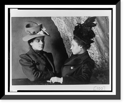 Historic Framed Print, [Two African American women, half-length portrait, facing each other],  17-7/8" x 21-7/8"