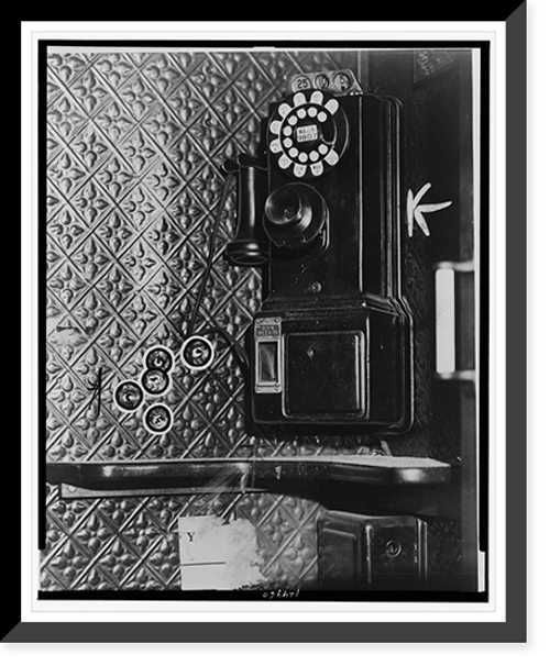 Historic Framed Print, [The telephone on which Vincent Coll was talking when murdered; bullet holes are on the left of the telephone],  17-7/8" x 21-7/8"