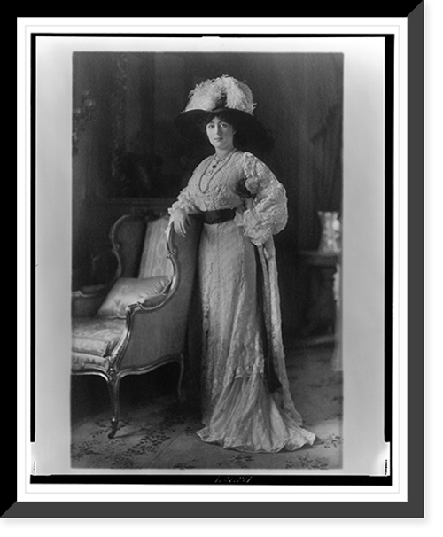 Historic Framed Print, [Evalyn Walsh McLean, full-length portrait, standing, facing front with right arm resting on back of chair],  17-7/8" x 21-7/8"